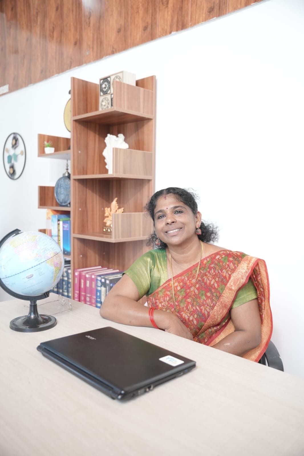 Headmistress at desk